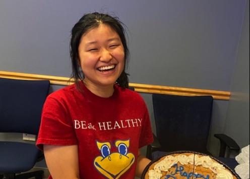 Hiroko holding a cookie cake for her birthday