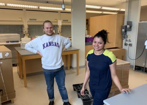 Matt and Nishama unpacking boxes in March 2020