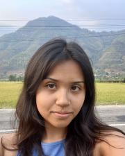 Woman in front of mountains