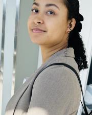 woman in a brown blazer